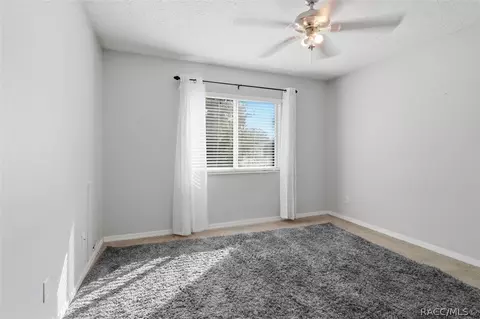 Bedroom - 1131 S Softwind Loop, Lecanto, FL 34461 photo 3 of 5
