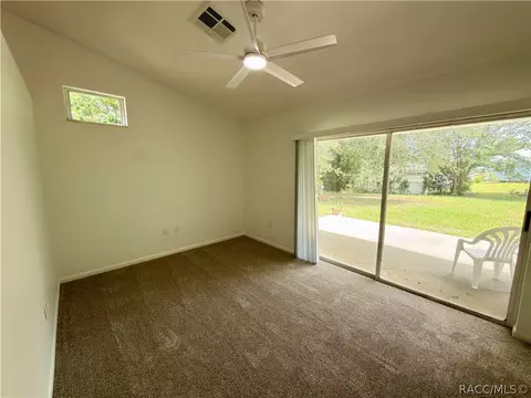 Bedroom - 1078 S Softwind Loop, Lecanto, FL 34461 photo 1 of 6