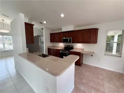 Kitchen - 1078 S Softwind Loop, Lecanto, FL 34461 photo 2 of 3
