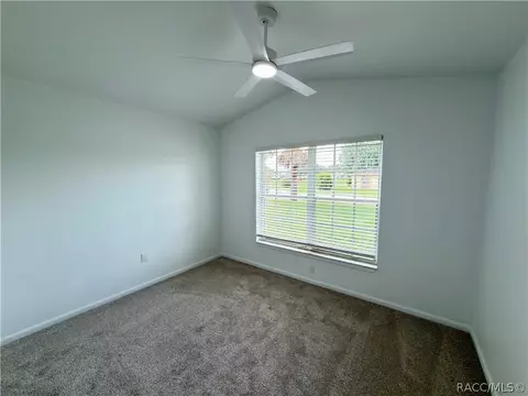 Bedroom - 1078 S Softwind Loop, Lecanto, FL 34461 photo 3 of 6
