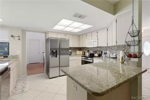 Kitchen - 409 N Turkey Pine Loop, Lecanto, FL 34461 photo 2 of 3