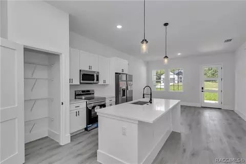 Kitchen - 225 E Caldwell Dr, Dunnellon, FL 34434 photo 2 of 4