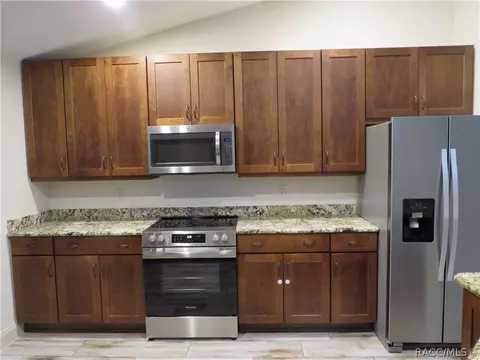 Kitchen - 6229 SE 12th Pl, Ocala, FL 34470 photo 4 of 5