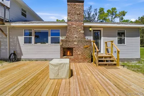 Exterior - 8810 E Hampton Point Rd, Inverness, FL 34450 photo 9 of 12