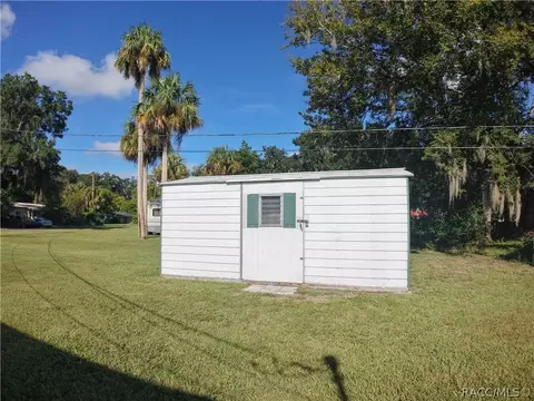 Exterior - 50 Risher Ave, Inglis, FL 34449 photo 4 of 11
