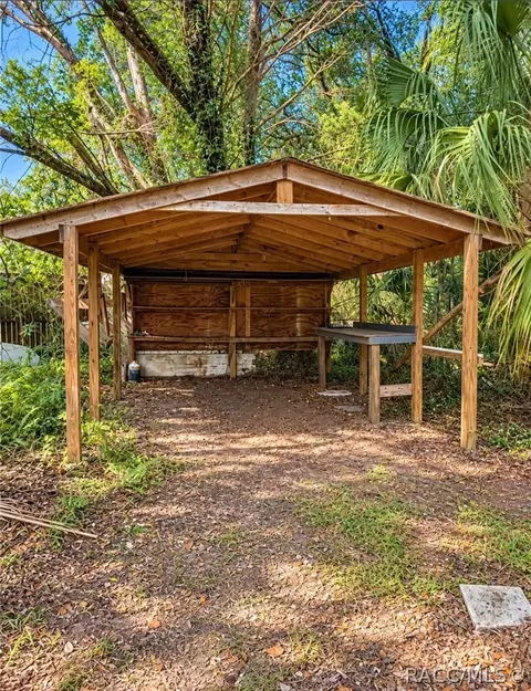 Exterior - 32 Palm Circle Dr, Inglis, FL 34449 photo 8 of 13