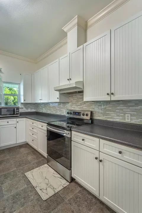 Kitchen - 9 Hammock Cove Rd, Eastpoint, FL 32328 photo 4 of 5