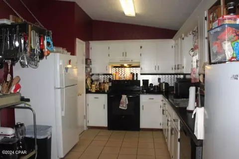 Kitchen - 25676 Evans St, Altha, FL 32421 photo 2 of 2