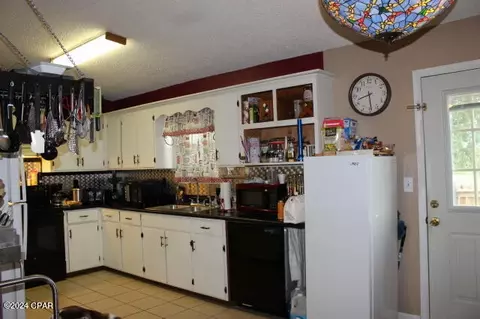 Kitchen - 25676 Evans St, Altha, FL 32421 photo 1 of 2