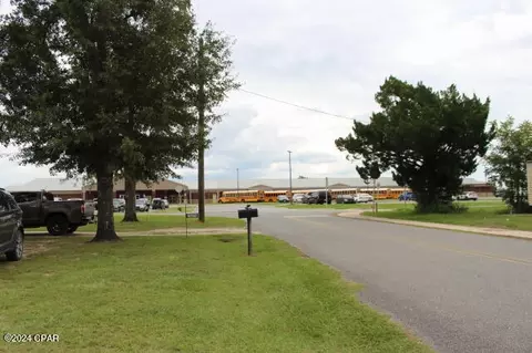 Exterior - 25676 Evans St, Altha, FL 32421 photo 5 of 9