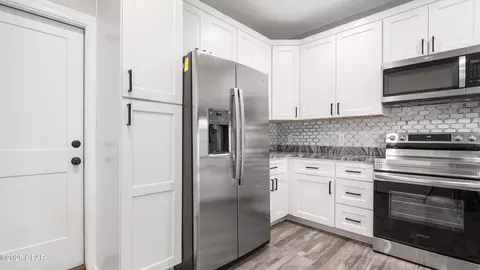 Kitchen - 1303 E 8th St, Lynn Haven, FL 32444 photo 2 of 4