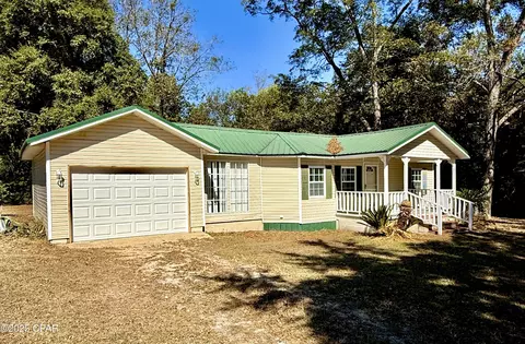 Exterior - 5678 Hummingbird Rd, Bascom, FL 32423 photo 3 of 6