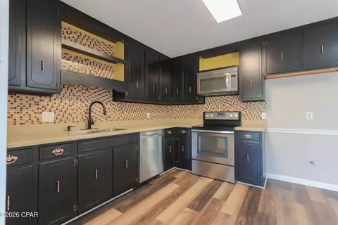 Kitchen - 710 E Pine Forest Dr, Lynn Haven, FL 32444 photo 2 of 2