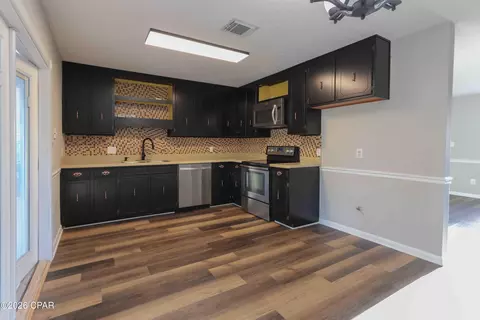 Kitchen - 710 E Pine Forest Dr, Lynn Haven, FL 32444 photo 1 of 2