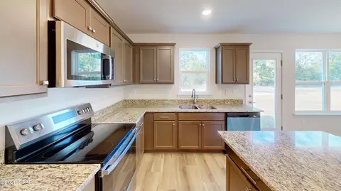 Kitchen - 3900 Bricknell Ave, Chipley, FL 32428 photo 2 of 2