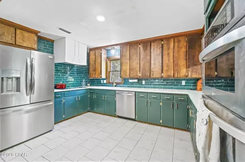Kitchen - 656 4th St, Chipley, FL 32428 photo 2 of 4