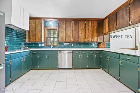 Kitchen - 656 4th St, Chipley, FL 32428 photo 3 of 4