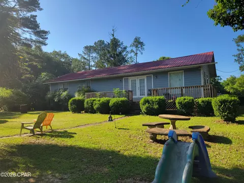 Exterior - 5184 13th Ave, Malone, FL 32445 photo 5 of 13