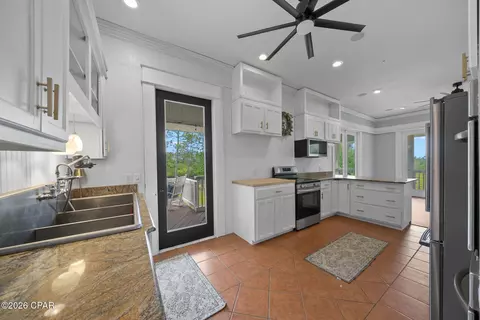 Kitchen - 24197 NW Pine Tree Trl, Fountain, FL 32438 photo 6 of 6