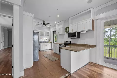 Kitchen - 24197 NW Pine Tree Trl, Fountain, FL 32438 photo 1 of 6