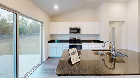Kitchen - 2225 Chase St, Chipley, FL 32428 photo 2 of 2