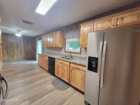 Kitchen - 5081 8th Ave, Malone, FL 32445 photo 2 of 2