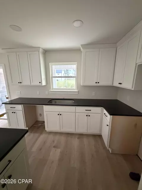 Kitchen - 4913 Pine Ave, Youngstown, FL 32466 photo 1 of 2