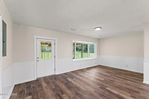 Living - 5953 Deerwood Dr, Malone, FL 32445 photo 5 of 7