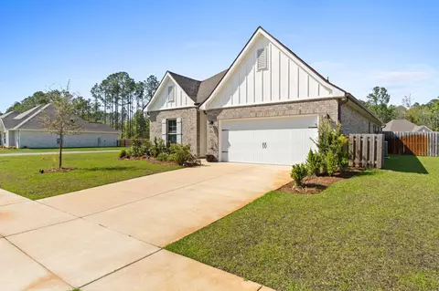 Exterior - 65 Apollo Ave #EAST, Freeport, FL 32439 photo 2 of 9