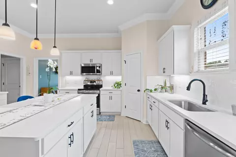 Kitchen - 65 Apollo Ave #EAST, Freeport, FL 32439 photo 6 of 6