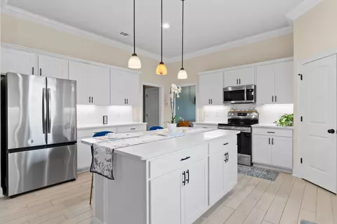 Kitchen - 65 Apollo Ave #EAST, Freeport, FL 32439 photo 2 of 6