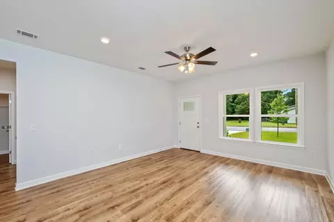 Living - 740 E Chestnut Ave, Crestview, FL 32539 photo 2 of 2