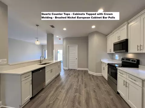 Kitchen - 445 Scooter Cv, Crestview, FL 32539 photo 2 of 2