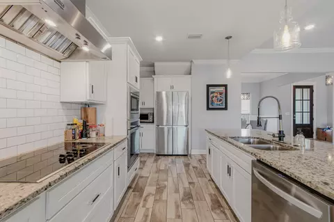 Kitchen - 559 Coastal Breeze Dr, Freeport, FL 32439 photo 3 of 4