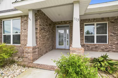 Exterior - 503 Tournament Ln, Freeport, FL 32439 photo 3 of 7