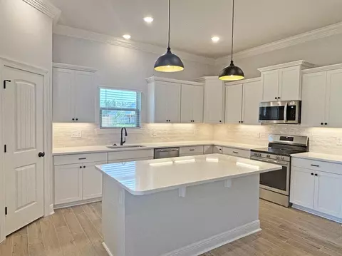 Kitchen - 275 E Tweet St, Freeport, FL 32439 photo 2 of 2