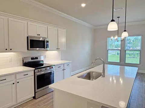 Kitchen - 251 E Tweet St, Freeport, FL 32439 photo 2 of 3
