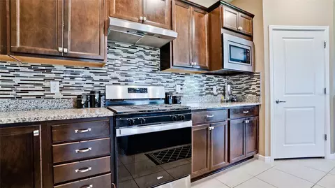 Kitchen - 8760 Ocean Tides Cv, Parrish, FL 34219 photo 1 of 3