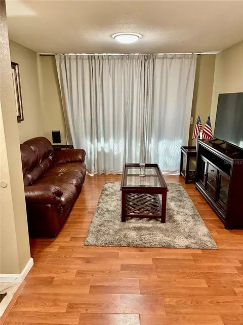 Living - 4122 Residence Dr #120, Fort Myers, FL 33901 photo 1 of 1