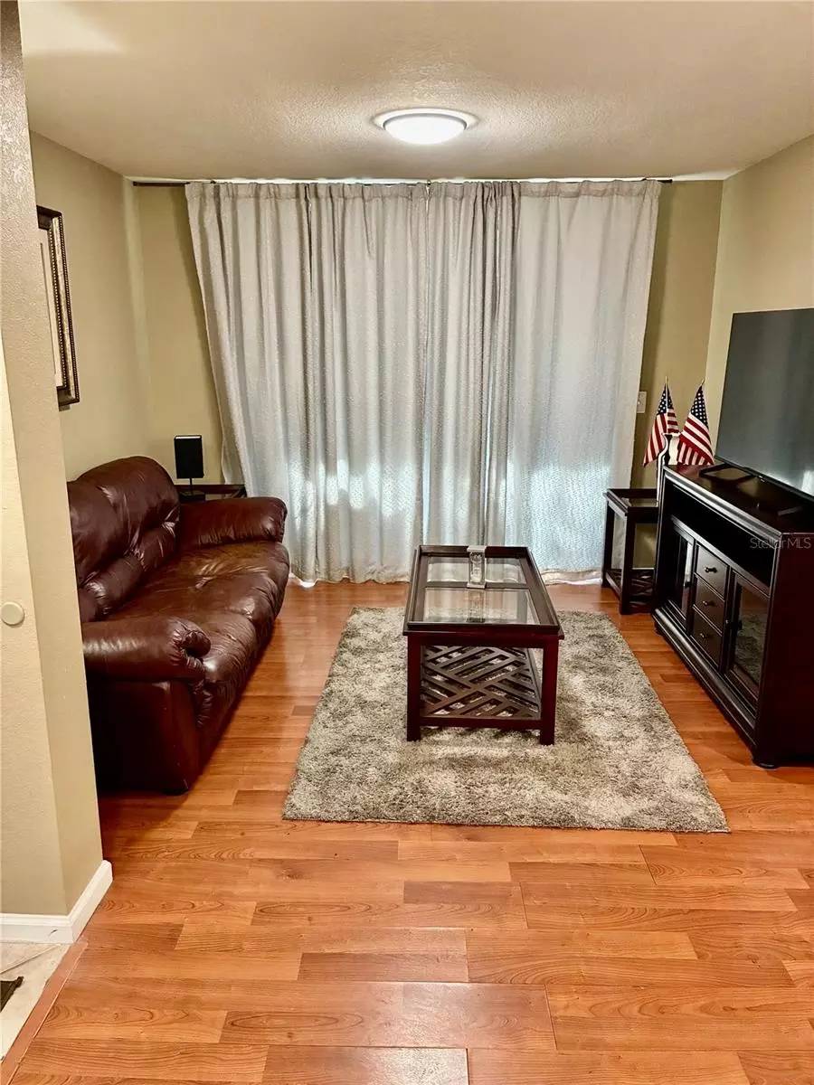 Living - 4122 Residence Dr #120, Fort Myers, FL 33901 photo 1 of 1