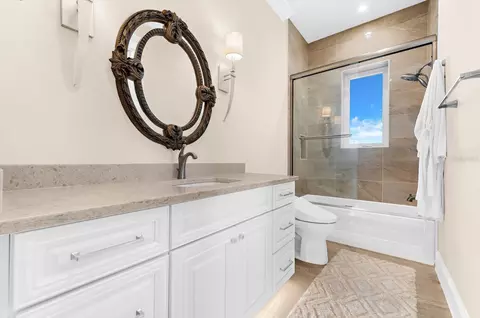 Bath - 511 Bayview Dr, Holmes Beach, FL 34217 photo 1 of 7