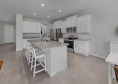 Kitchen - 16454 Woodside Gln, Parrish, FL 34219 photo 5 of 6