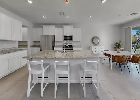 Kitchen - 16454 Woodside Gln, Parrish, FL 34219 photo 3 of 6