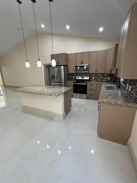 Kitchen - 1911 SW 7th Ave, Okeechobee, FL 34974 photo 2 of 3