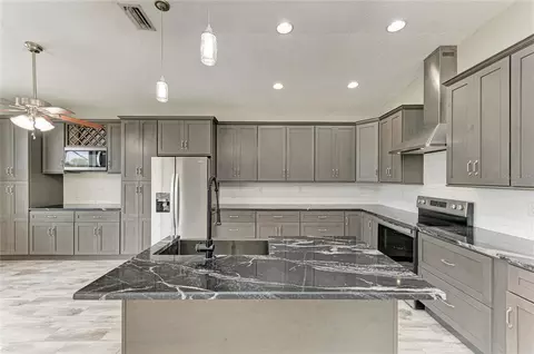 Kitchen - 13710 Golf Course Rd, Parrish, FL 34219 photo 3 of 10