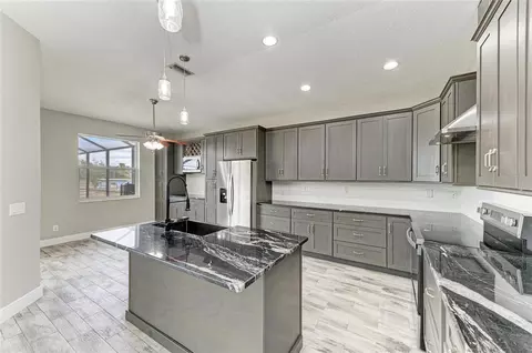 Kitchen - 13710 Golf Course Rd, Parrish, FL 34219 photo 2 of 10
