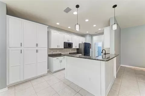 Kitchen - 8005 115th Ave E, Parrish, FL 34219 photo 2 of 7