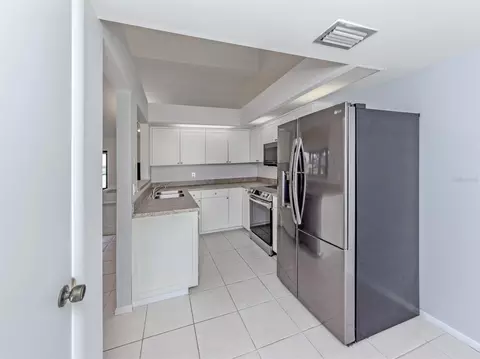 Kitchen - 764 Sarabay Rd #8, Osprey, FL 34229 photo 3 of 4