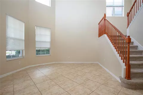 Living - 18048 Java Isle Dr, Tampa, FL 33647 photo 1 of 14
