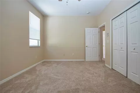 Bedroom - 18048 Java Isle Dr, Tampa, FL 33647 photo 7 of 10